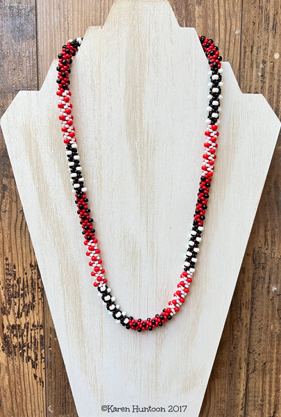 Red and black bead on sale necklace